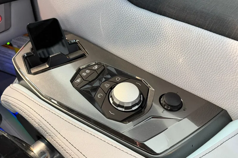 Slide: The Image of 2026 Nautique Super Air Nautique G25 Paragon control panel with sleek design and modern features. - 19