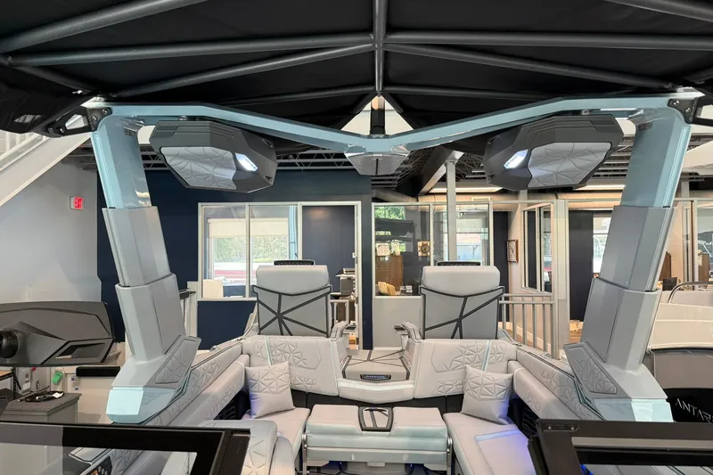 Slide: The Image of Interior of 2026 Nautique Super Air Nautique G25 Paragon boat, featuring luxury seating and modern design. - 26