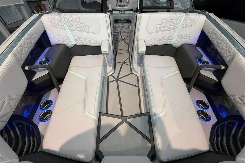 Slide: The Image of Luxurious interior of 2026 Nautique Super Air Nautique G25 Paragon with modern seating and lighting. - 7