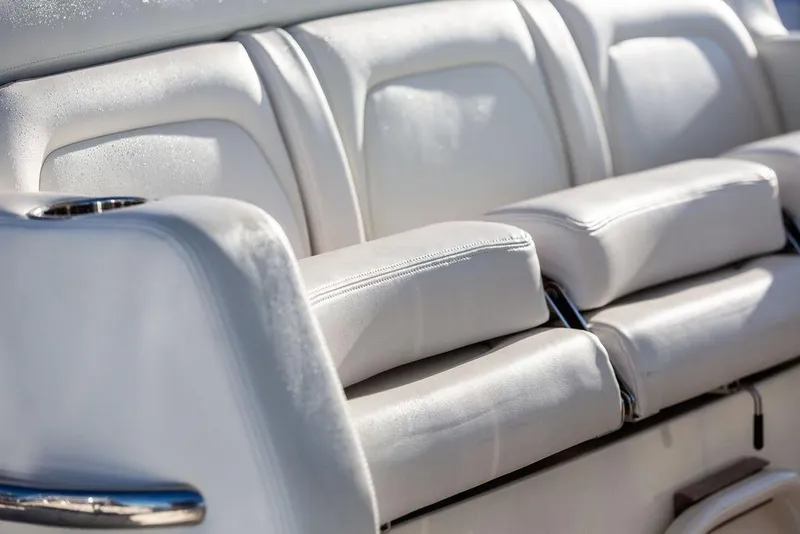 Slide: The Image of Cup holders on the 2024 Hinckley Sport Boat 40c dashboard. - 21