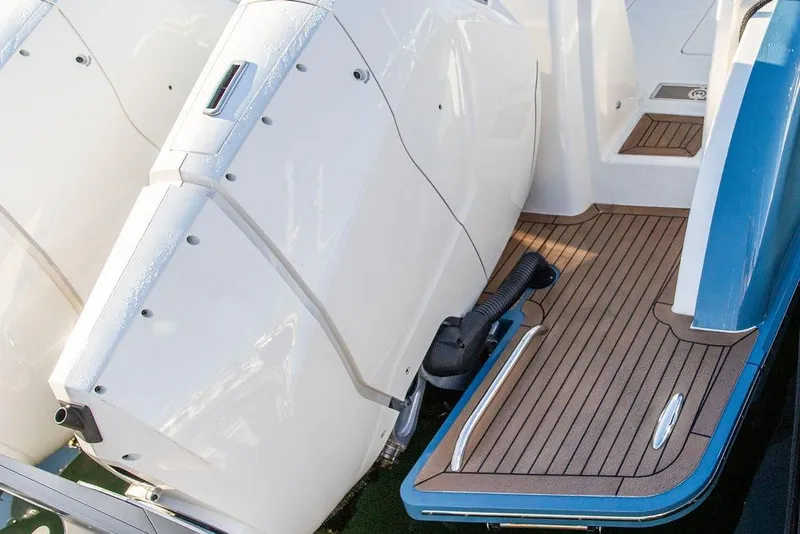 Slide: The Image of Luxurious white seating on 2024 Hinckley Sport Boat 40c, showcasing premium craftsmanship. - 22