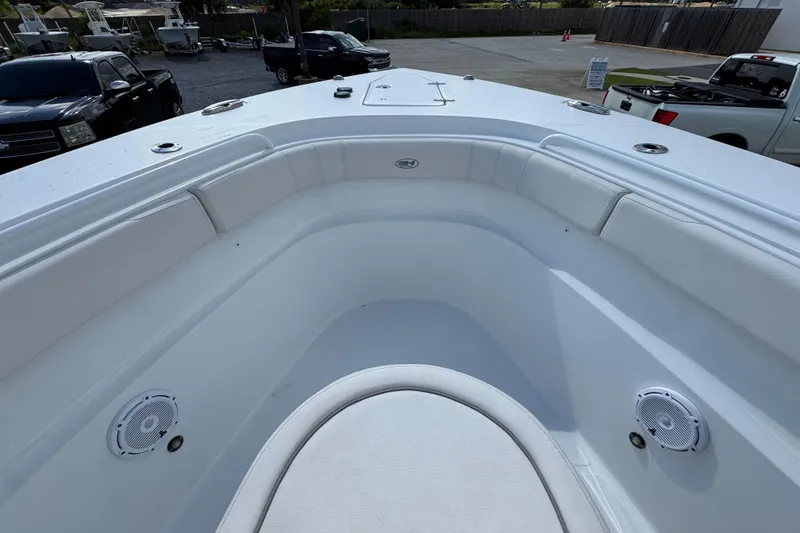 Slide: The Image of 2023 Sea Hunt Gamefish 30 Coffin Box boat interior with seating and speakers. - 18