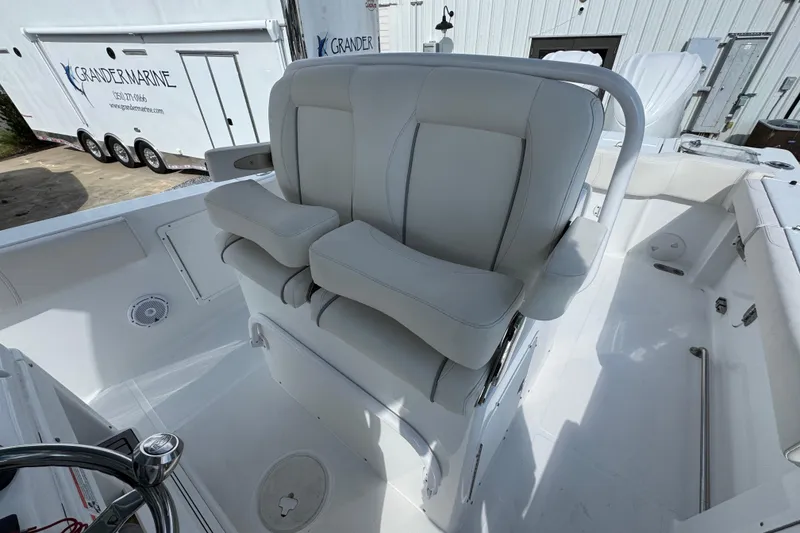 Slide: The Image of 2023 Sea Hunt Gamefish 30 Coffin Box boat with comfortable seating and modern design. - 26