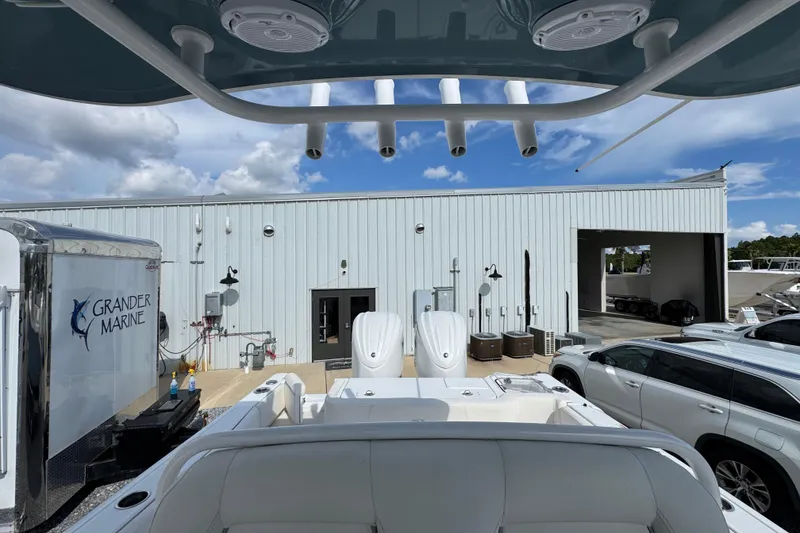 Slide: The Image of 2023 Sea Hunt Gamefish 30 Coffin Box at Grander Marine dealership, exterior view. - 28