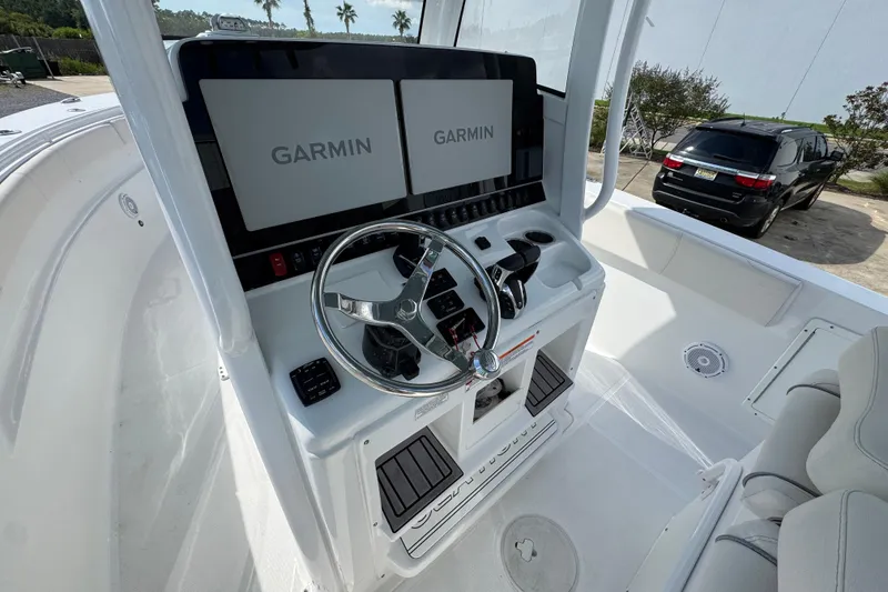Slide: The Image of 2023 Sea Hunt Gamefish 30 Coffin Box boat console with dual Garmin displays. - 29