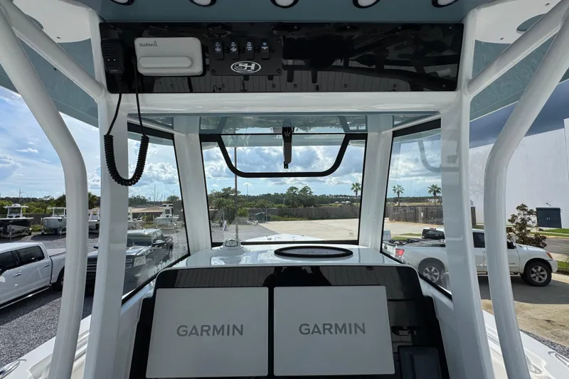 Slide: The Image of Interior view of 2023 Sea Hunt Gamefish 30 Coffin Box with Garmin navigation system. - 31