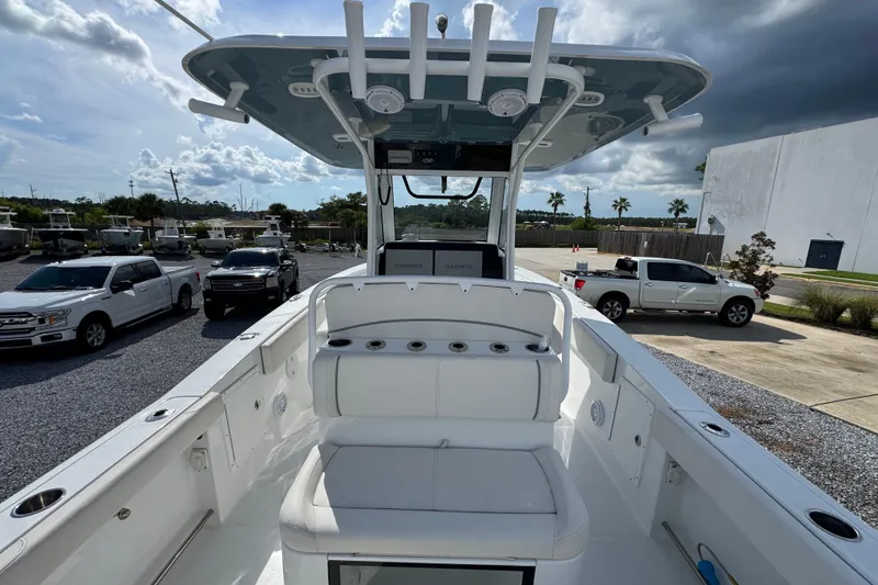 Slide: The Image of 2023 Sea Hunt Gamefish 30 Coffin Box boat, featuring spacious deck and modern design. - 33