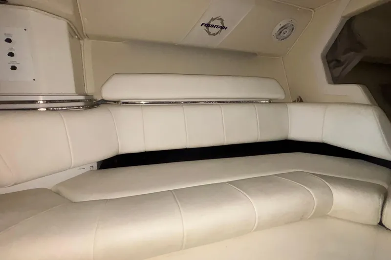 Slide: The Image of 2006 Fountain 42 Executioner interior with white leather seating and logo. - 14