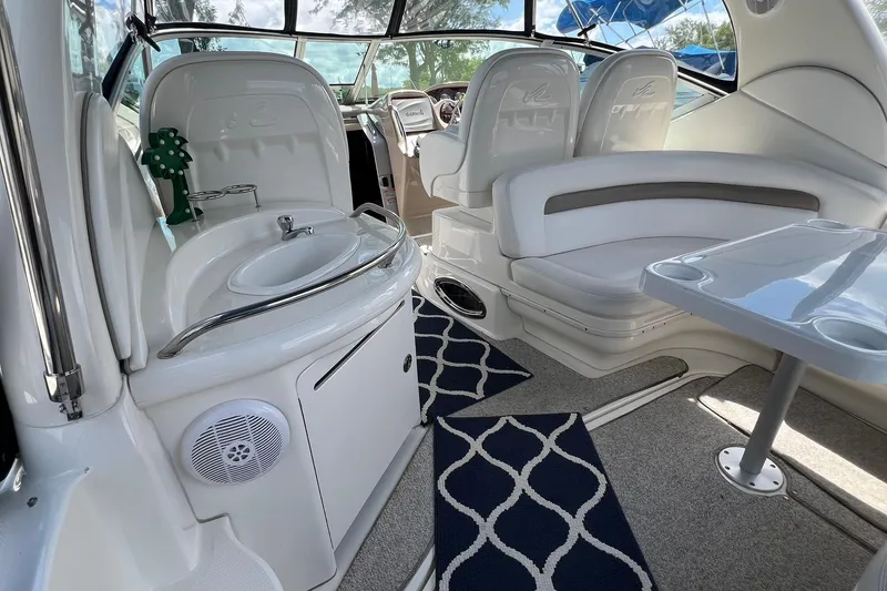 Slide: The Image of Luxurious interior of 2005 Sea Ray 340 Sundancer yacht with seating and sink area. - 4