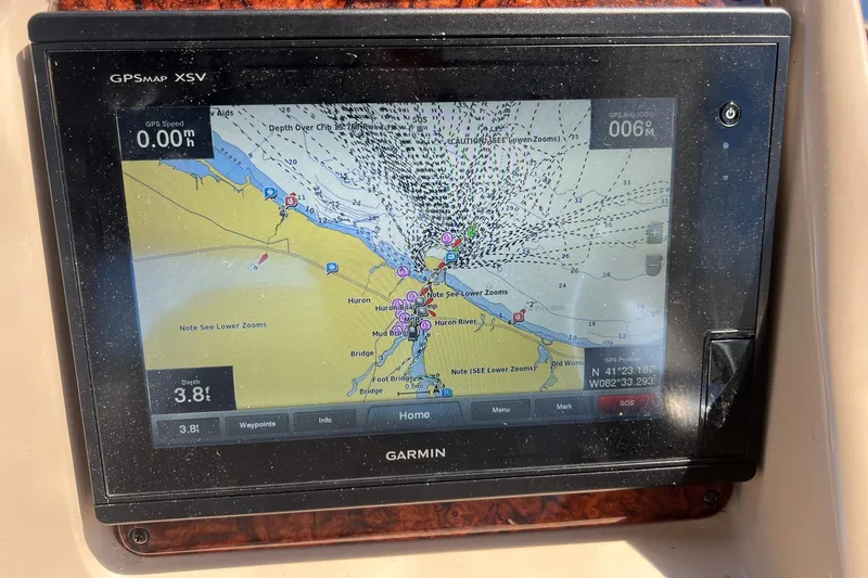 Slide: The Image of Garmin GPS display on 2005 Sea Ray 340 Sundancer showing nautical map and coordinates. - 9