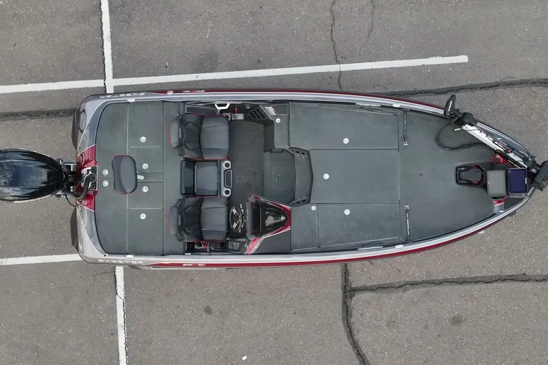 Slide: The Image of Overhead view of 2023 Skeeter FXR21 boat in a parking lot. - 15