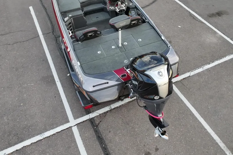 Slide: The Image of 2023 Skeeter FXR21 boat with Yamaha outboard motor in parking lot. - 8