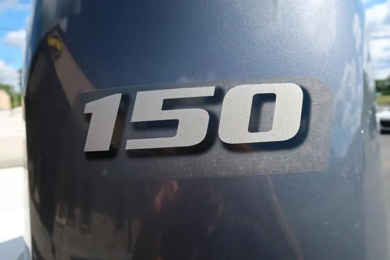Slide: The Image of Close-up of '150' emblem on 2020 Starcraft MDX OB 211 E OB boat. - 10