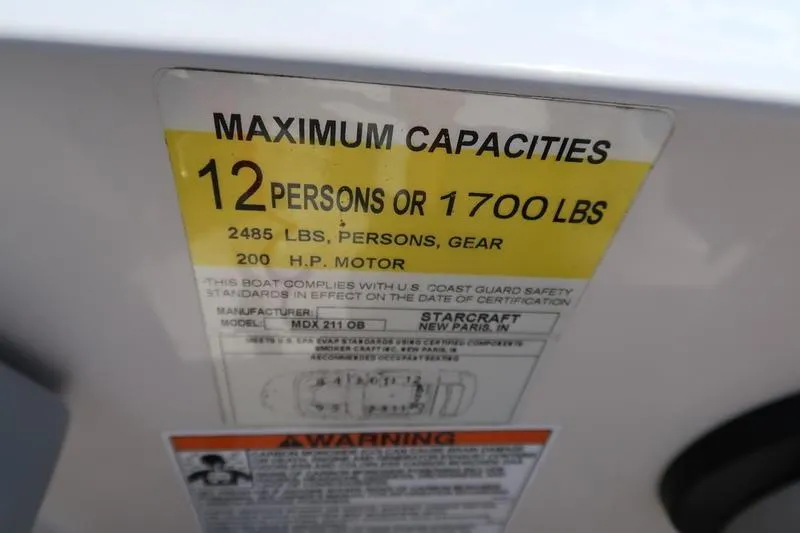 Slide: The Image of Maximum capacity label for 2020 Starcraft MDX OB 211 E OB boat. - 11