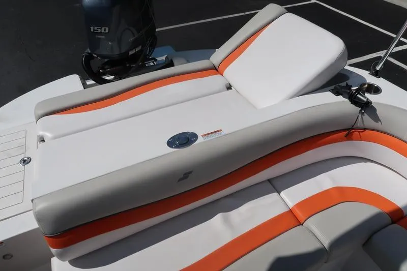 Slide: The Image of 2020 Starcraft MDX OB 211 E OB boat with orange and white seating. - 12