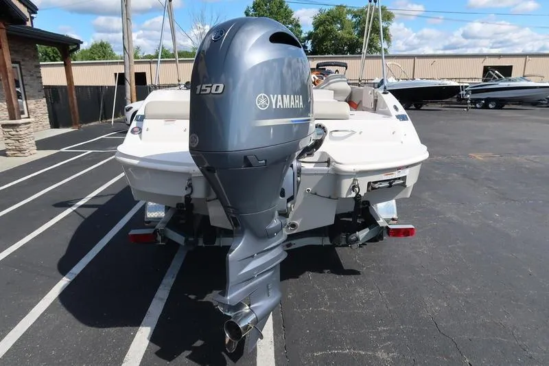 Slide: The Image of 2020 Starcraft MDX OB 211 E OB boat with Yamaha 150 outboard motor. - 2