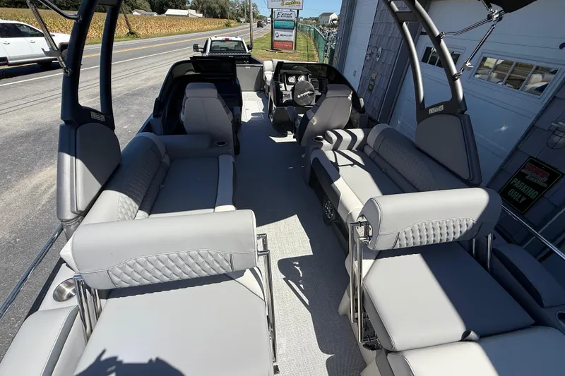 Slide: The Image of 2026 Avalon 2585 Catalina Windshield Quad Lounger with luxurious seating and modern design. - 11