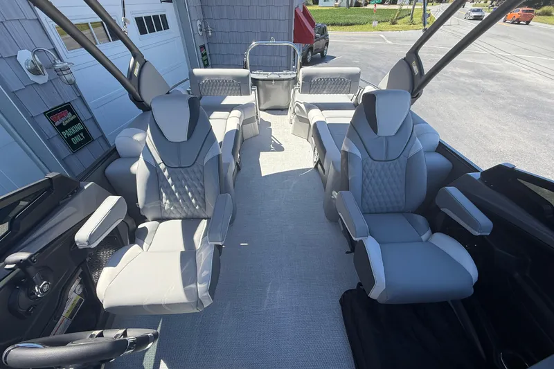 Slide: The Image of Luxurious interior of 2026 Avalon 2585 Catalina Windshield Quad Lounger with premium seating. - 19