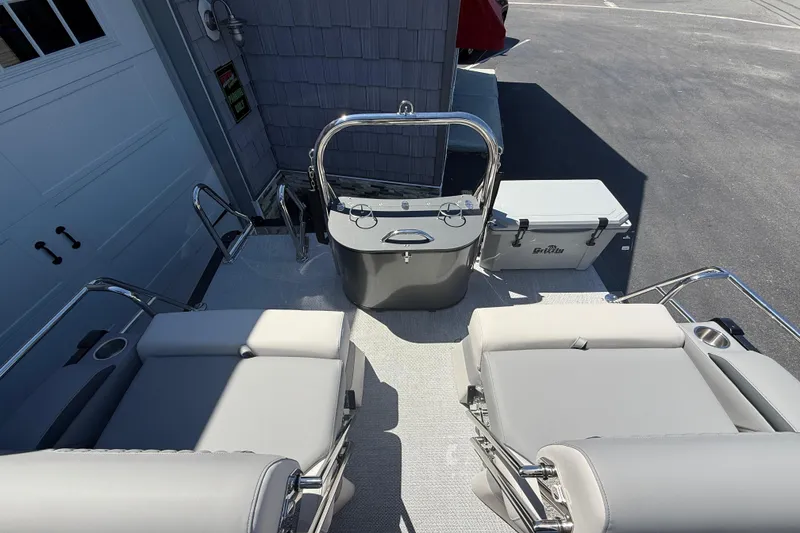 Slide: The Image of 2026 Avalon 2585 Catalina boat interior with loungers and control console, featuring sleek design. - 23