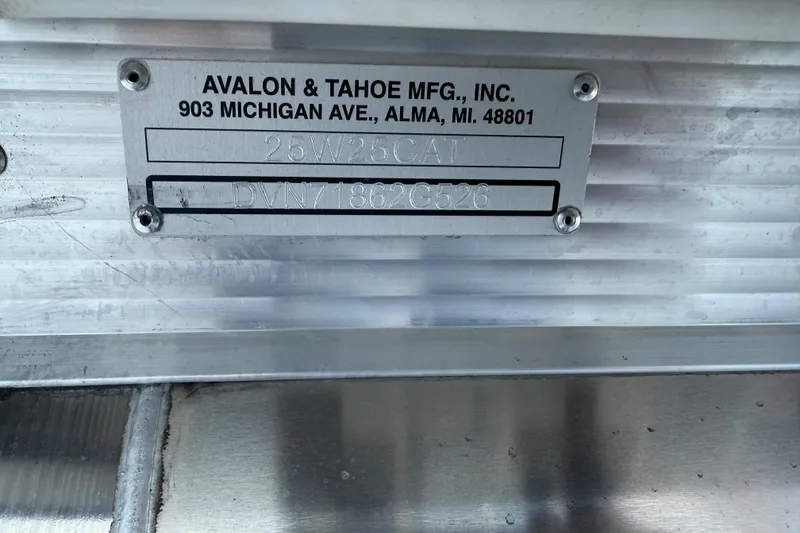 Slide: The Image of Metal identification plate on Avalon 2585 Catalina Windshield Quad Lounger, 2026 model. - 24