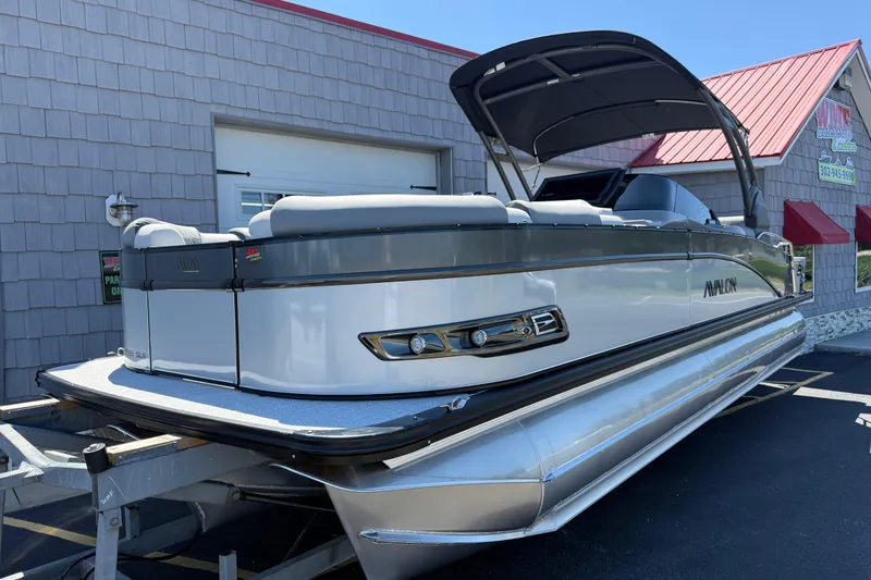 Slide: The Image of 2026 Avalon 2585 Catalina Windshield Quad Lounger Tri-toon with Mercury 350hp V-10 engine. - 3