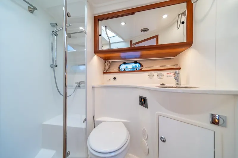Slide: The Image of Luxurious bathroom in 2022 Nimbus 405 Coupé yacht with shower and modern fixtures. - 31