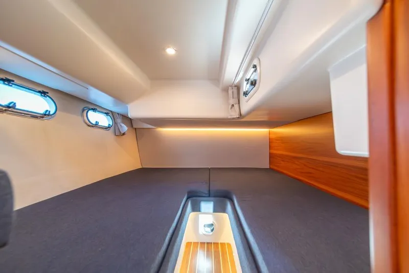 Slide: The Image of Interior cabin of 2022 Nimbus 405 Coupé yacht with modern design and ambient lighting. - 33