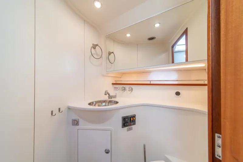 Slide: The Image of Modern bathroom interior in 2022 Nimbus 405 Coupé yacht, featuring sleek design and fixtures. - 38