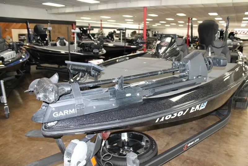Slide: The Image of 2019 Skeeter FX21 LE bass boat in showroom with Garmin equipment. - 7