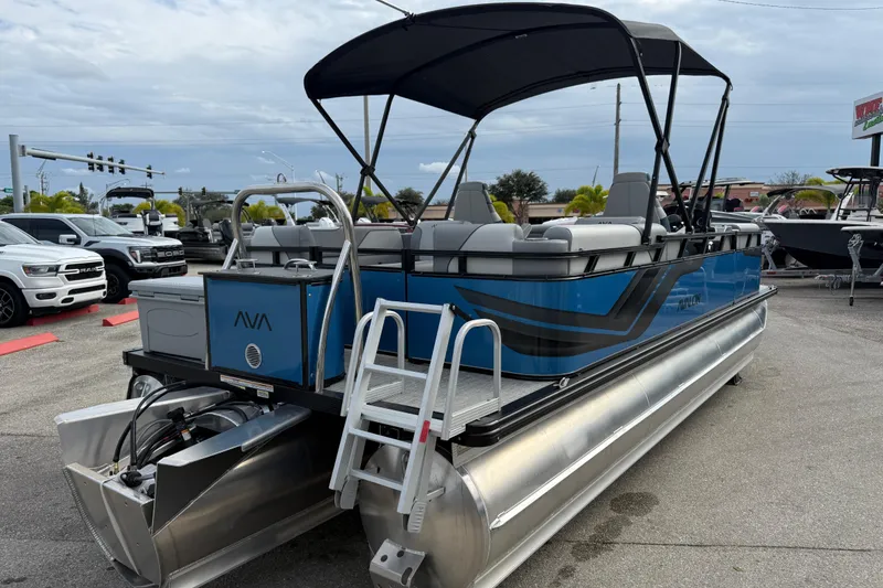 Slide: The Image of 2026 Avalon 2385 Venture 85 Quad Lounger Tri Toon boat with blue exterior and canopy. - 34