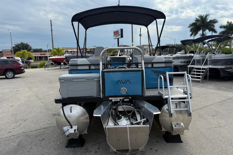 Slide: The Image of 2026 Avalon 2385 Venture 85 Quad Lounger Tri Toon, high-performance boat at dealership. - 35