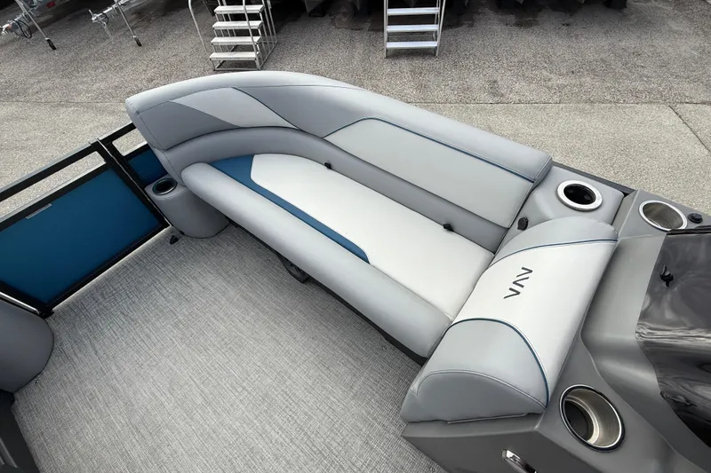 Slide: The Image of 2026 Avalon 2385 Venture 85 Quad Lounger interior with sleek seating and cup holders. - 43