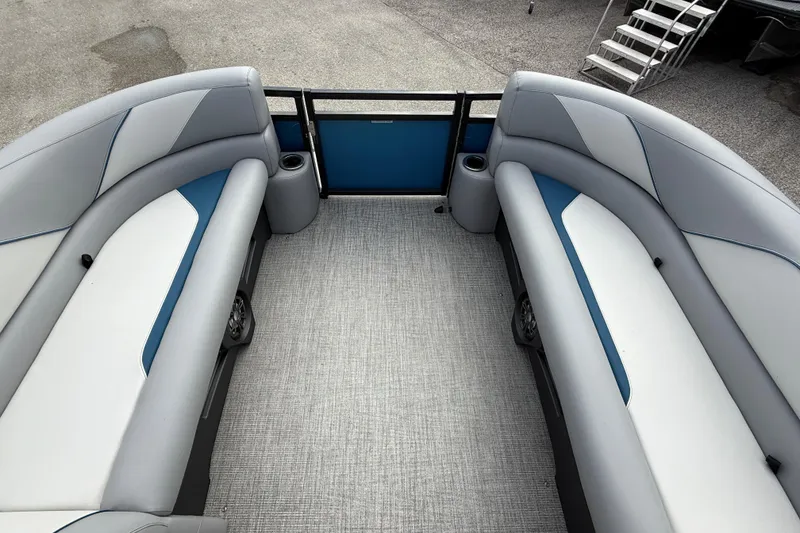Slide: The Image of 2026 Avalon 2385 Venture 85 Quad Lounger interior with gray and blue seating. - 44