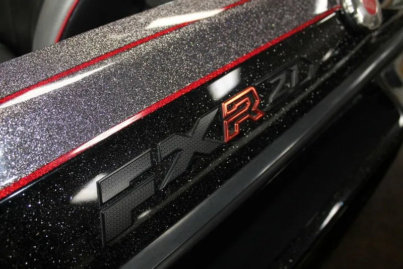 Slide: The Image of 2025 Skeeter FXR21L boat with glittery black and red detailing. - 4