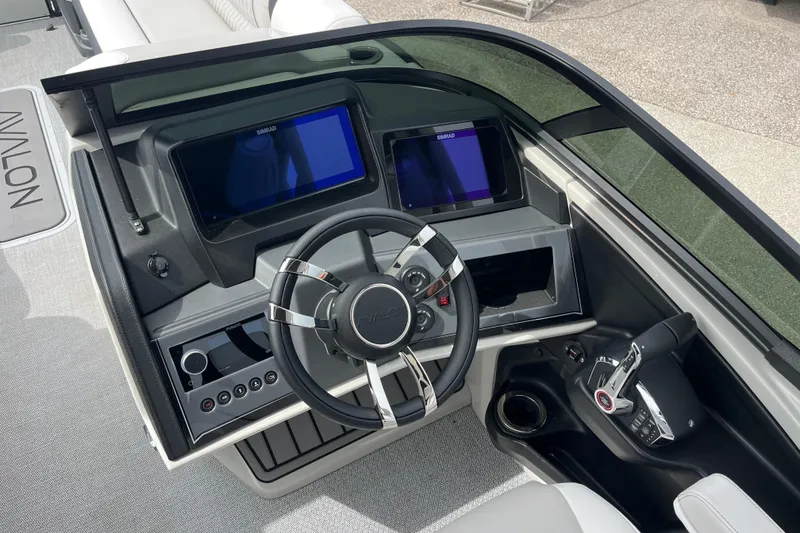 Slide: The Image of Steering console of 2026 Avalon 2785 Excalibur LTD with advanced controls and displays. - 13