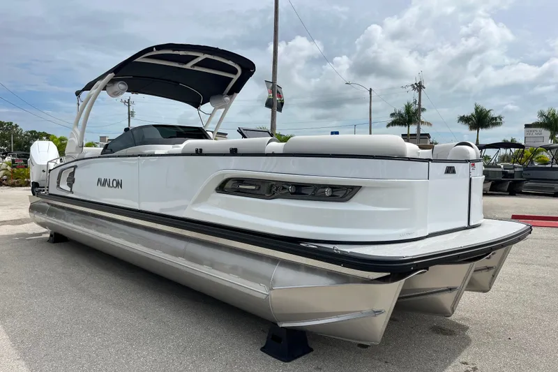 Slide: The Image of 2026 Avalon 2785 Excalibur LTD pontoon boat with twin Mercury 400hp V-10 engines. - 3