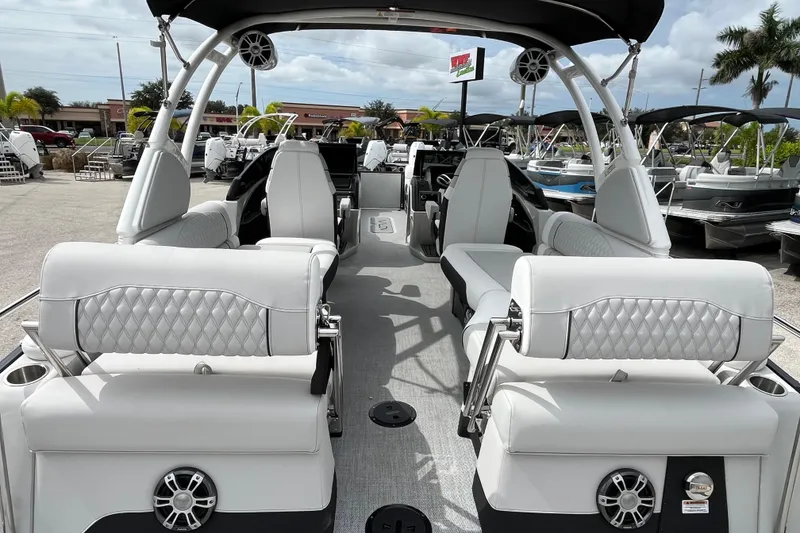 Slide: The Image of 2026 Avalon 2785 Excalibur LTD boat interior with luxurious seating and modern design. - 9