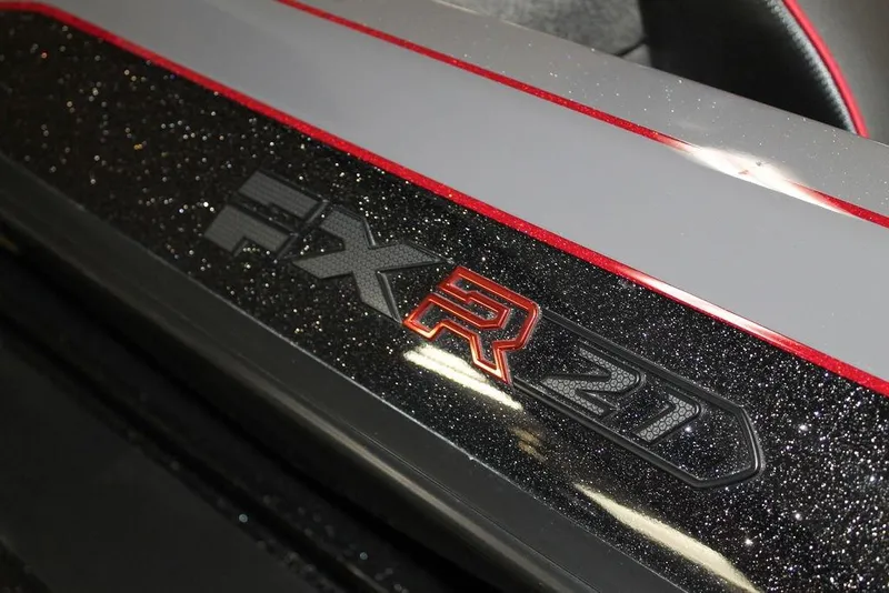 Slide: The Image of 2025 Skeeter FXR21 Apex boat with glittery black and red detailing. - 3