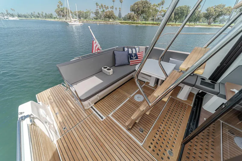Slide: The Image of 2023 Beneteau Antares 11 Fly yacht with elegant deck seating and nautical decor. - 33