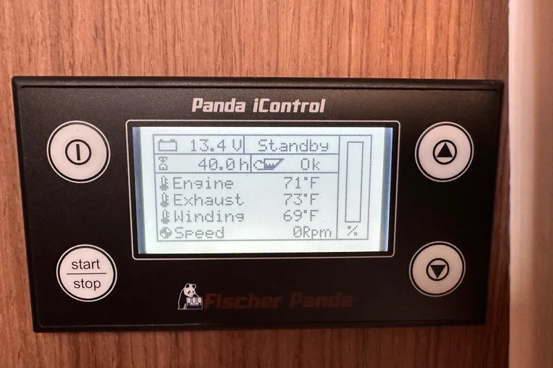 Slide: The Image of Control panel of 2023 Beneteau Antares 11 Fly, displaying engine and exhaust temperatures. - 69