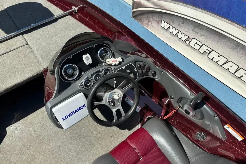 Slide: The Image of 2010 Ranger 178 VS boat dashboard with Lowrance electronics and steering wheel. - 15