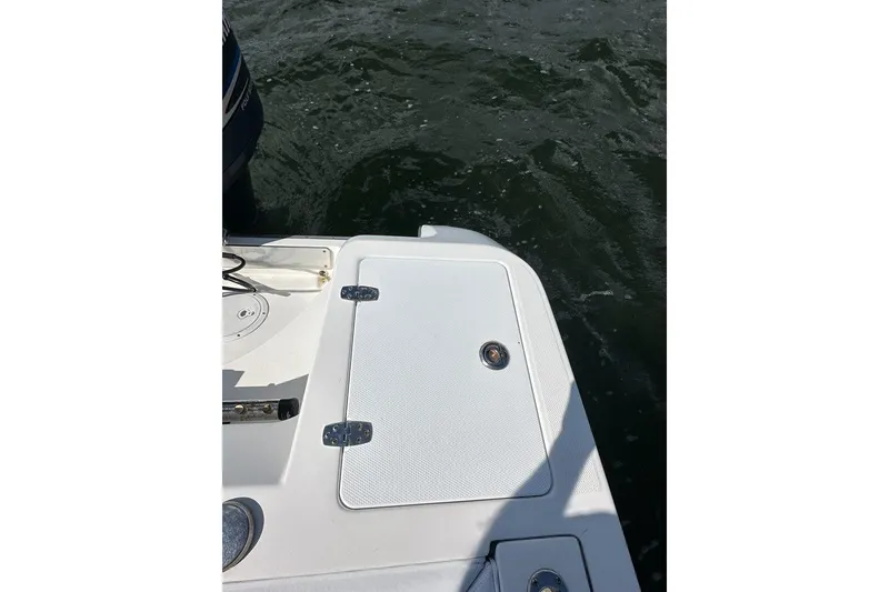 Slide: The Image of 2007 Edgewater 245CC boat deck with water in the background. - 17