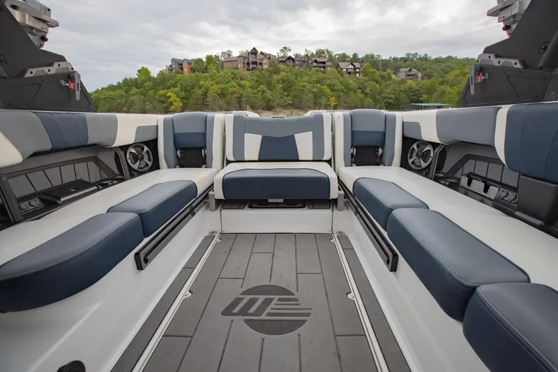 Slide: The Image of 2021 Malibu Wakesetter 23 MXZ interior with spacious seating and modern design. - 11