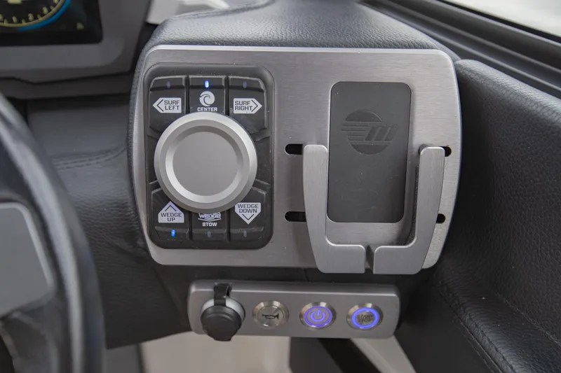 Slide: The Image of Control panel of 2021 Malibu Wakesetter 23 MXZ boat with surf and wedge settings. - 19