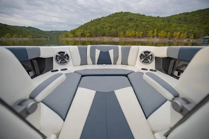 Slide: The Image of 2021 Malibu Wakesetter 23 MXZ interior with stylish seating and scenic lake view. - 21