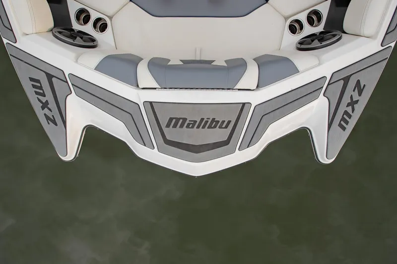 Slide: The Image of 2021 Malibu Wakesetter 23 MXZ boat deck, featuring sleek design and branding. - 25