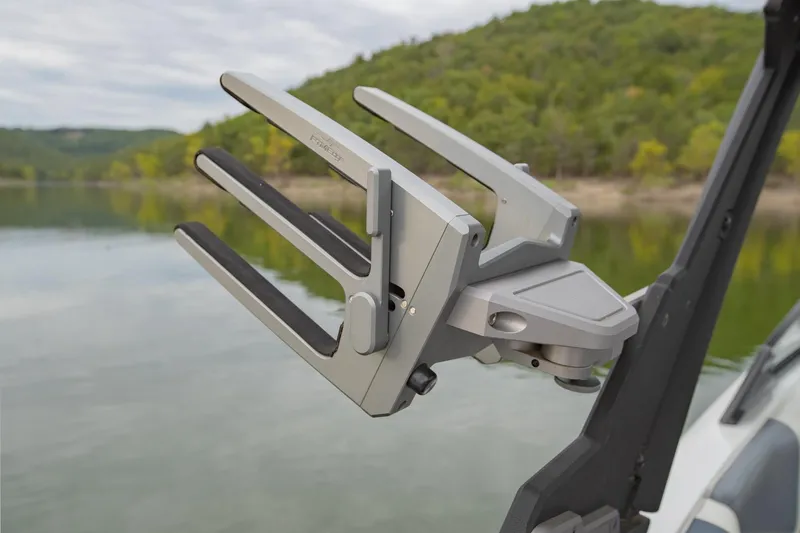 Slide: The Image of 2021 Malibu Wakesetter 23 MXZ wakeboard rack on a serene lake background. - 28