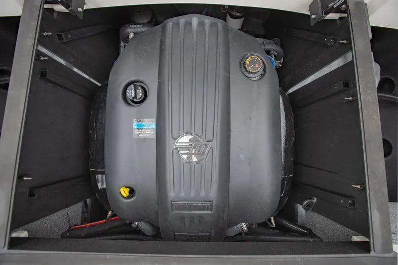 Slide: The Image of Engine compartment of 2021 Malibu Wakesetter 23 MXZ boat, showcasing Monsoon engine. - 29