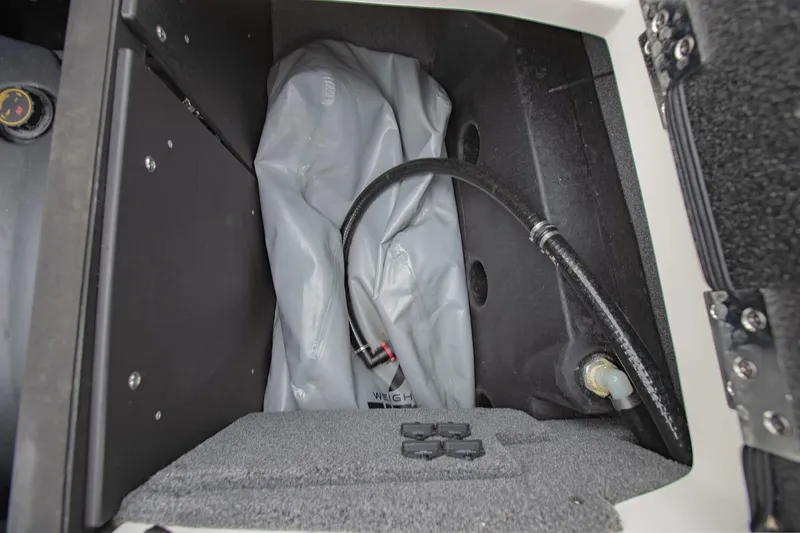 Slide: The Image of 2021 Malibu Wakesetter 23 MXZ ballast compartment with hose and fittings. - 30