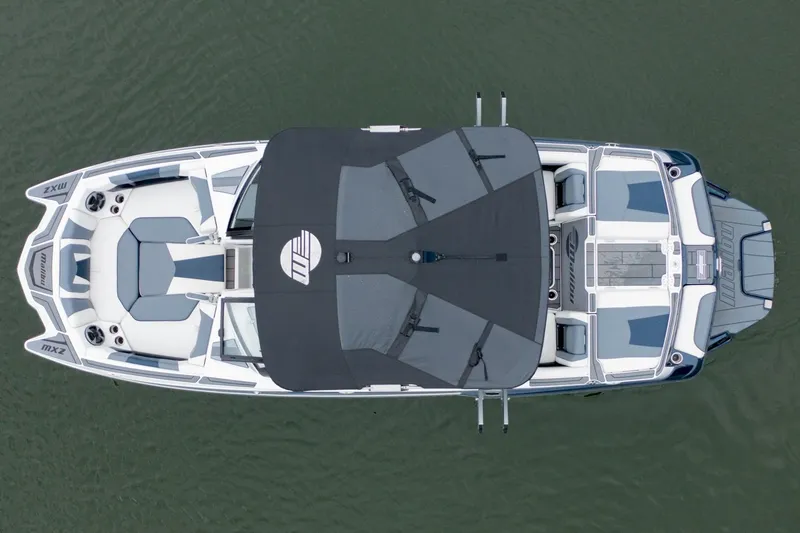 Slide: The Image of Overhead view of 2021 Malibu Wakesetter 23 MXZ boat on water. - 5